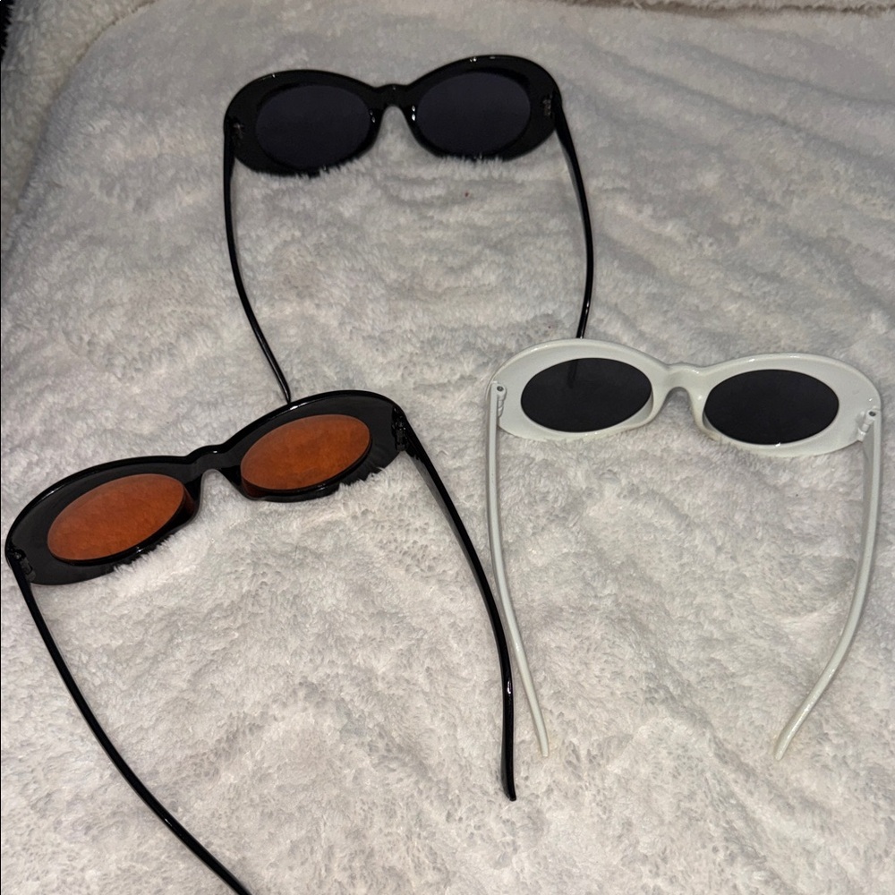 Elegant Black, White, and Orange Sunglasses Trio - Picture 3 of 6